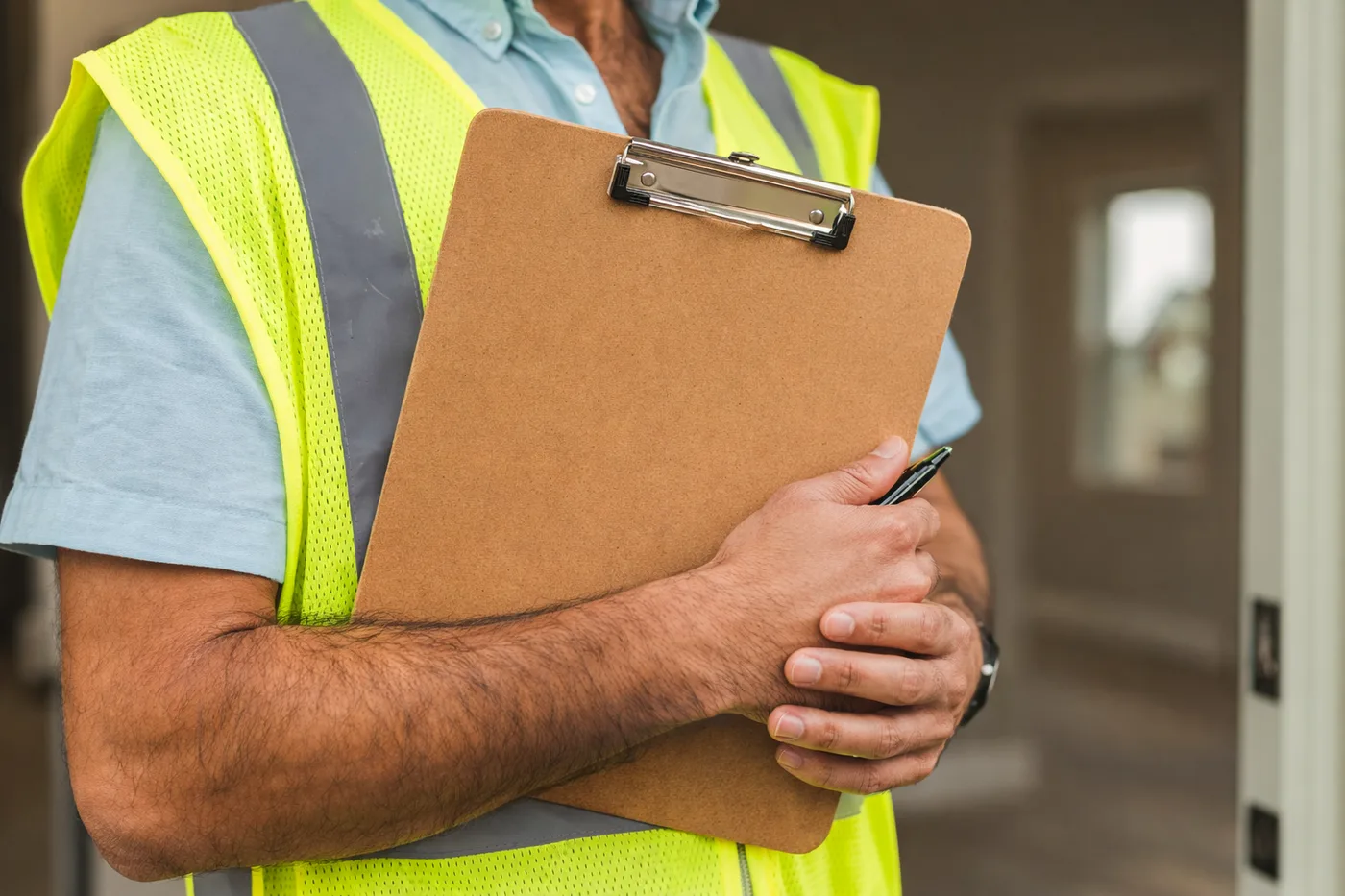 Trueform inspector reviewing a checklist on site