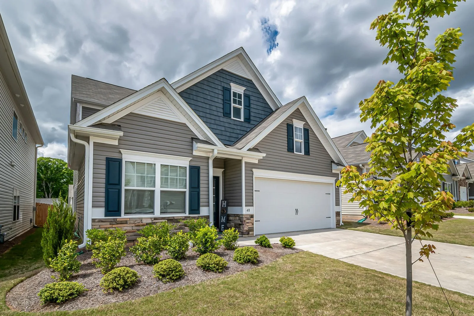 A well-kept residential home exterior in Fredericton